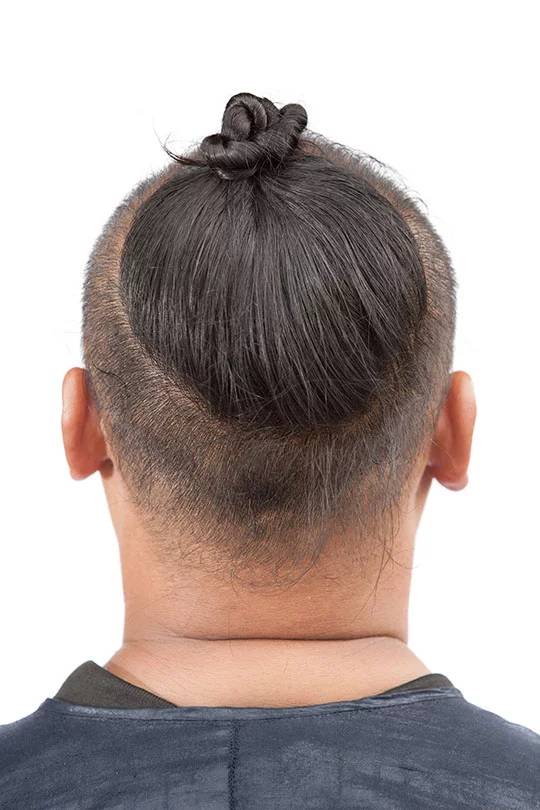 прическа Man Bun